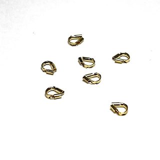 Užbaigimas sidabrinis paauksuotas " pasaga " troseliui 0.6 mm